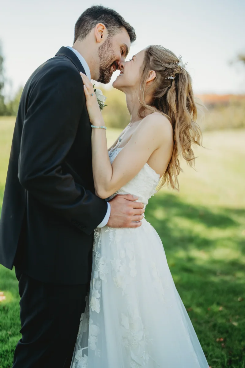 Couple kissing at golden hour