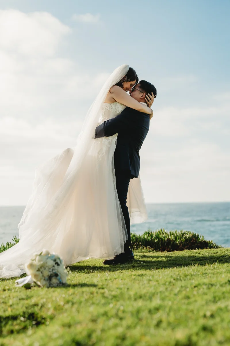 Couple on the cliffs at sunset